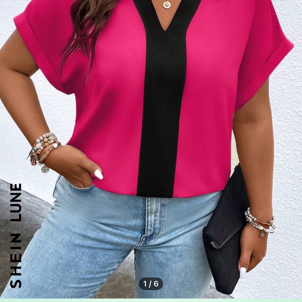 Hot pink and black short sleeve blouse.